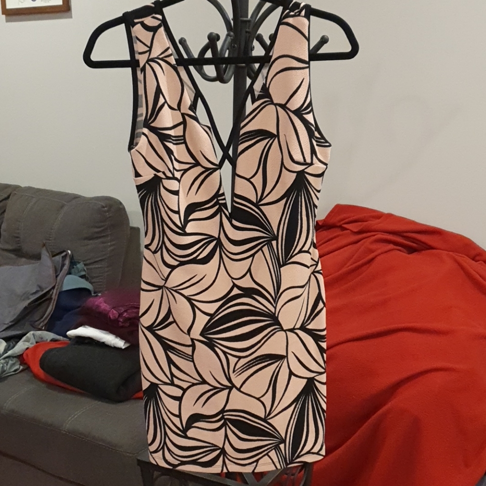 Deep V neckline and cross back dress